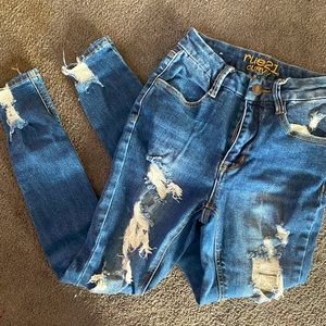 ripped blue jeans !!